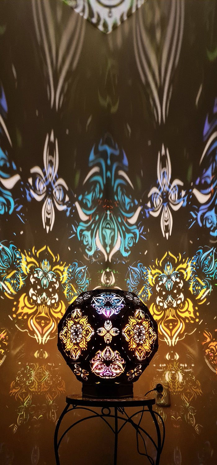 Psychedelic wooden geometric shadow lamp that projects colorful trippy shadows onto the walls