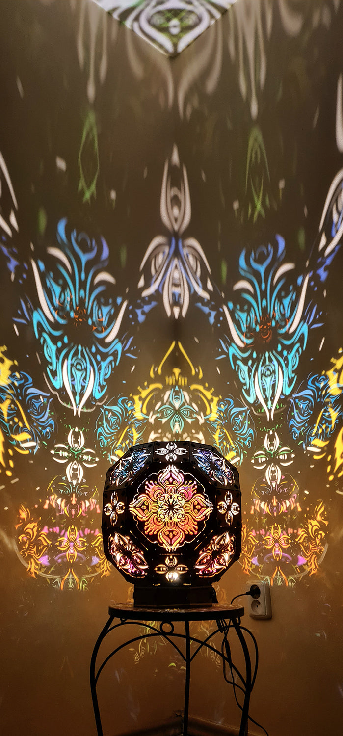 Psychedelic wooden geometric shadow lamp that projects colorful trippy shadows onto the walls
