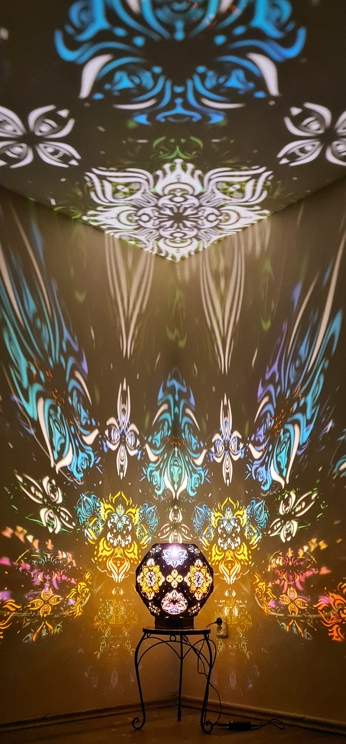 Psychedelic wooden geometric shadow lamp that projects colorful trippy shadows onto the walls