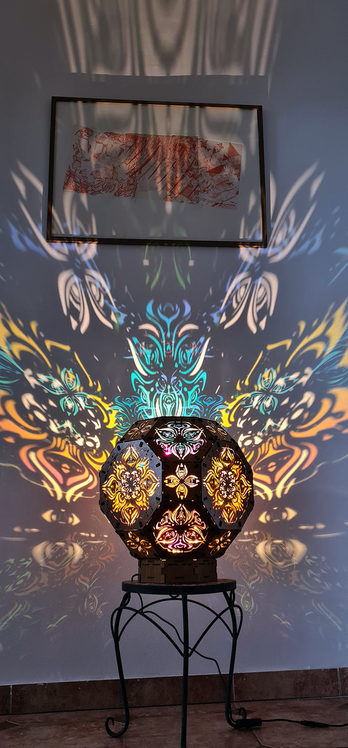 Psychedelic wooden geometric shadow lamp that projects colorful trippy shadows onto the walls