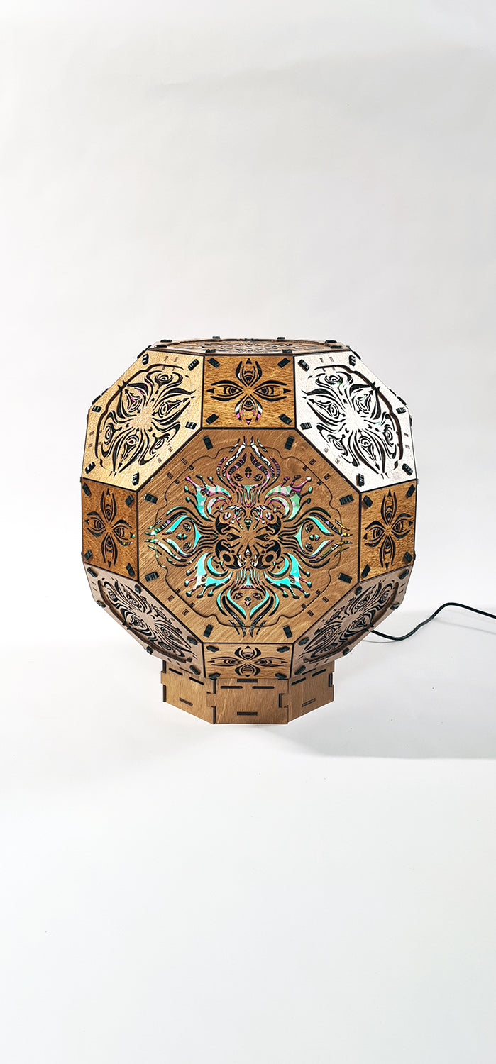 Psychedelic wooden geometric shadow lamp that projects colorful trippy shadows onto the walls