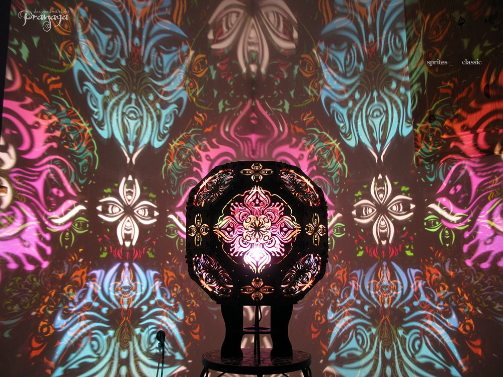 pranaya design and y0y0art's geometric wooden shadow lamp projecting trippy organic shadows across the walls
