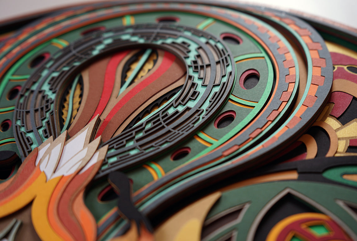 Layered paper art of forest spirit with foxes, mushrooms, and acorn, symbolizing growth, nature’s energy, and oneness.