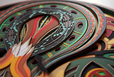 Layered paper art of forest spirit with foxes, mushrooms, and acorn, symbolizing growth, nature’s energy, and oneness.