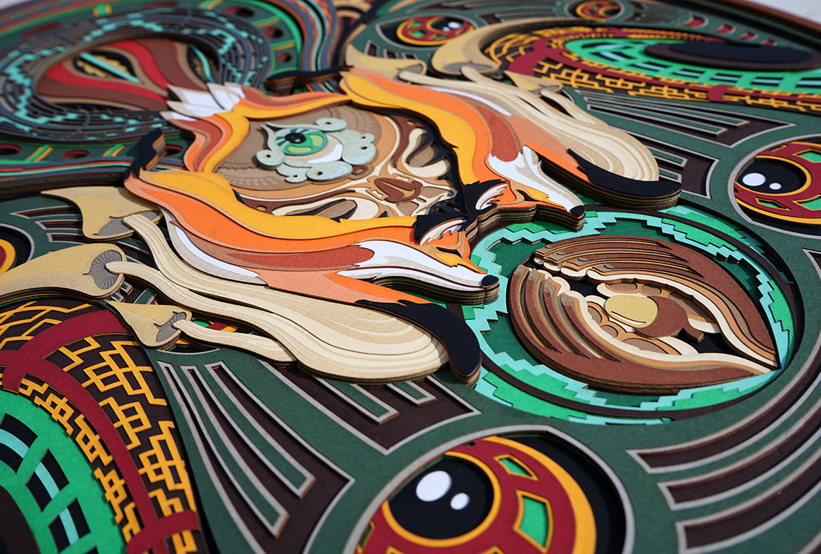 Layered paper art of forest spirit with foxes, mushrooms, and acorn, symbolizing growth, nature’s energy, and oneness.