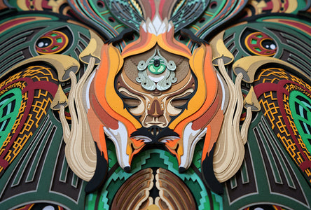 Layered paper art of forest spirit with foxes, mushrooms, and acorn, symbolizing growth, nature’s energy, and oneness.