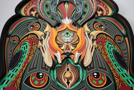 Layered paper art of forest spirit with foxes, mushrooms, and acorn, symbolizing growth, nature’s energy, and oneness.