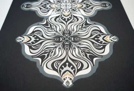 Layered grayscale paper artwork from the Metamorphs series where mandala geometry shifts into creature like spirits.