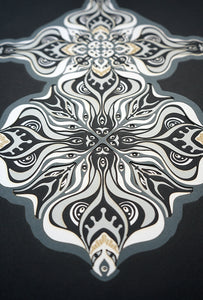 Layered grayscale paper artwork from the Metamorphs series where mandala geometry shifts into creature like spirits.