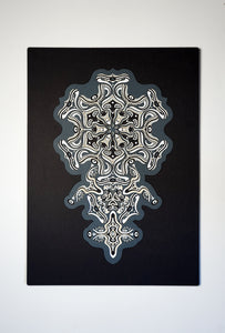 Intricate monochrome paper layers arranged in a mandala structure, creating emerging spirit faces and abstract creatures.