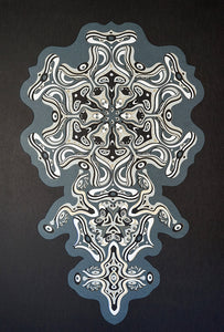 Intricate monochrome paper layers arranged in a mandala structure, creating emerging spirit faces and abstract creatures.