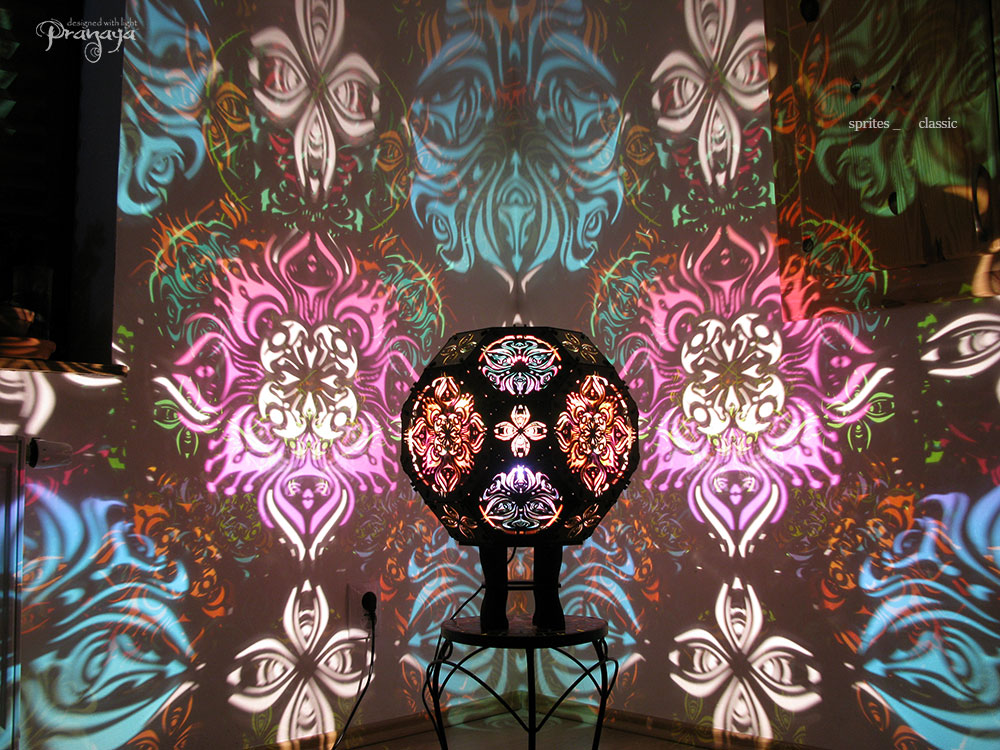 pranaya design and y0y0art's geometric wooden shadow lamp projecting trippy organic shadows across the walls