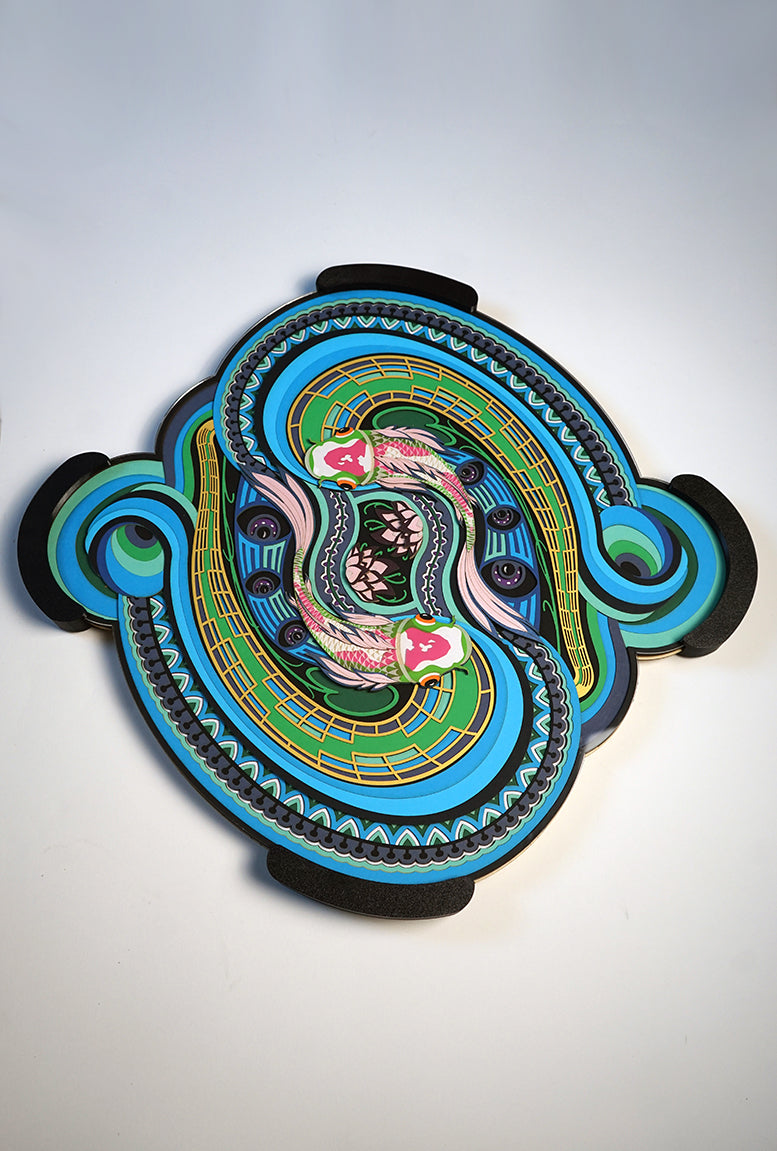 Layered paper art with two koi fish flowing with the grace, symbolizing serenity, letting go and peace of mind.