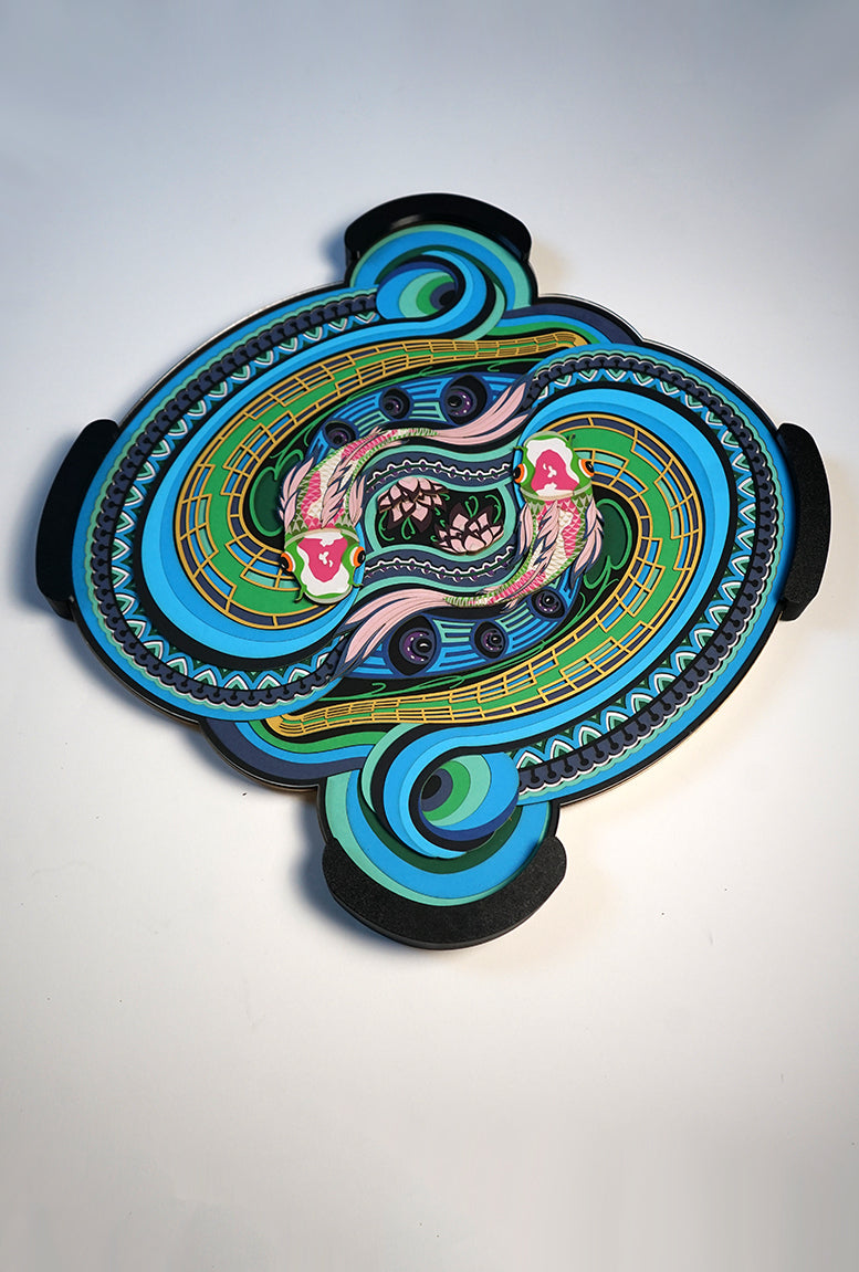 Layered paper art with two koi fish flowing with the grace, symbolizing serenity, letting go and peace of mind.
