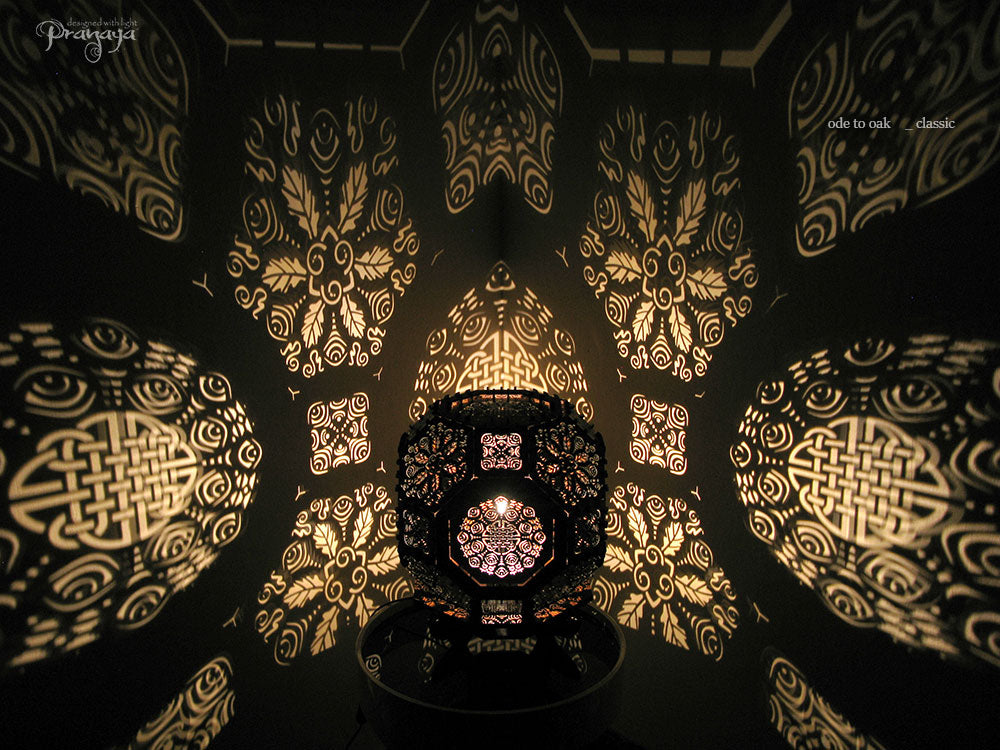 pranaya design light art casting shadows of oak leaf mandala for spiritual grow
